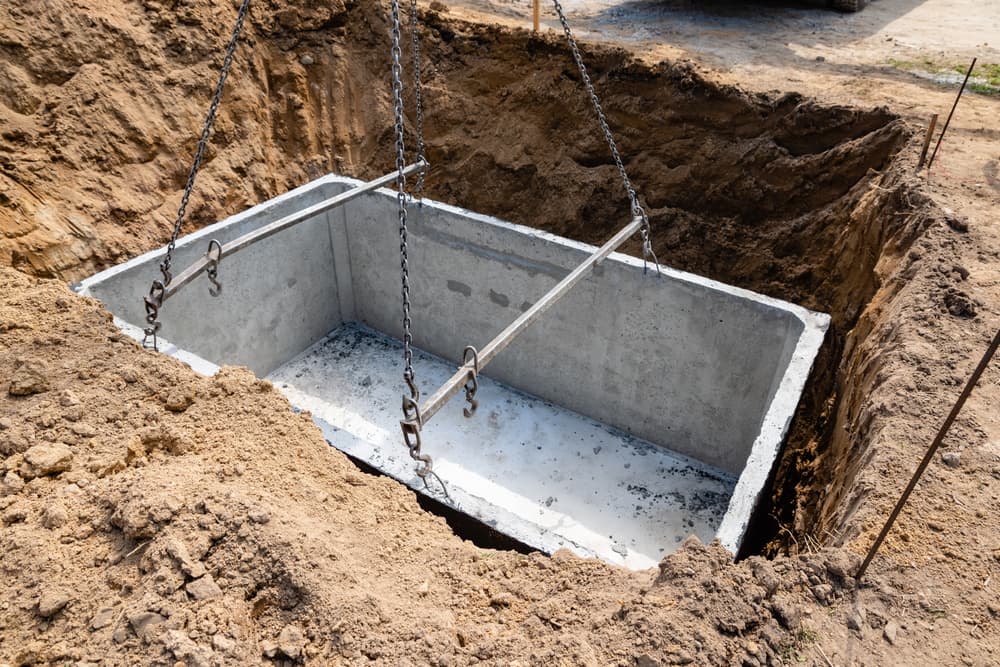 Where should a water meter pit be installed
