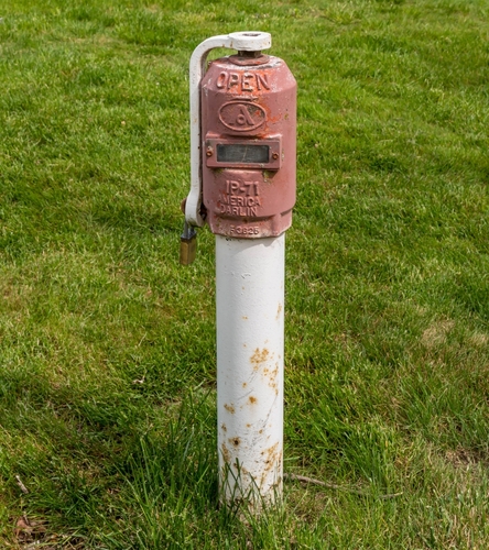 What are the requirements for an NFPA 13 post-indicator valve